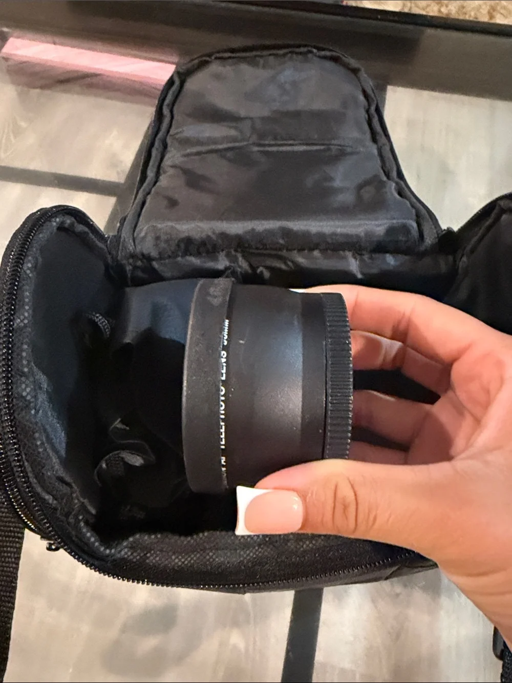 Canon Black DSLR Camera with Black Lens and Red-Trim Strap